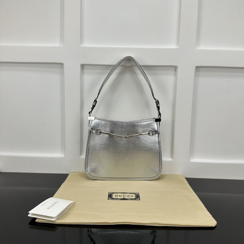 G*u*i top handle bags